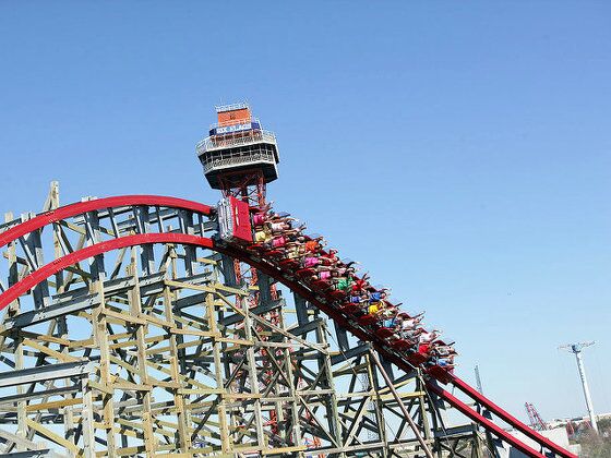 Six Flags Texas Giant roller coaster takes a turn with excited passengers (Credit: Six Flags Over Texas Communications)
