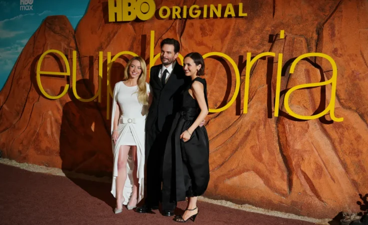 Sydney Sweeney, from left, Sam Levinson, and Maude Apatow arrive at the premiere of "Euphoria" season three on Tuesday, April 7, 2026, at the TCL Chinese Theatre in Los Angeles. (Photo by Jordan Strauss/Invision/AP)