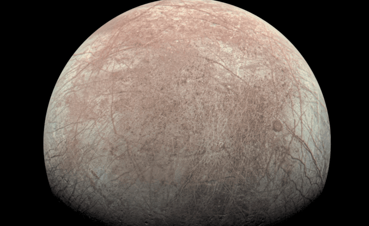This image provided by NASA, processed by Kevin M. Gill, shows Jupiter's moon Europa captured by the Juno spacecraft on Sept. 29, 2022, with north to the left. Research published Monday, March 4, 2024, suggests there's less oxygen on the icy surface of Jupiter's moon Europa than thought — and that could affect what if any life might be lurking in the moon’s underground ocean. (Kevin M. Gill/NASA/JPL-Caltech/SwRI via AP)