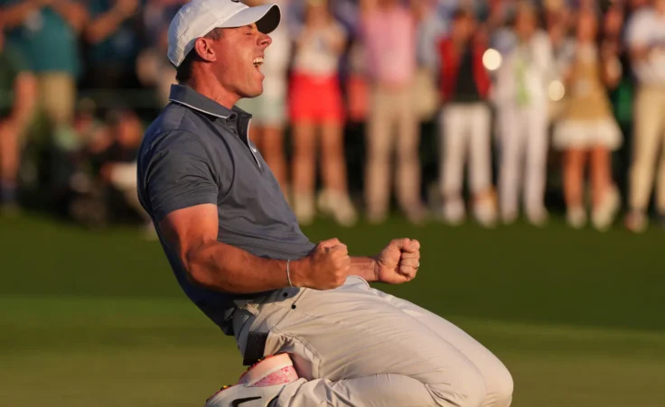 Rory McIlroy, of Northern Ireland, celebrates winning in a playoff against Justin Rose, of England, after the final round the Masters golf tournament, Sunday, April 13, 2025, in Augusta, Ga. (AP Photo/Matt Slocum)