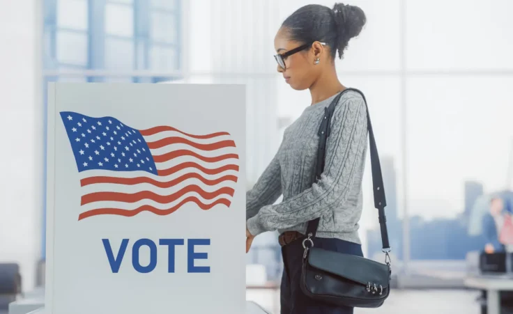 A Black woman voting on Election Day in the United States. By Gorodenkoff/stock.adobe.com. congressional maps Alabama