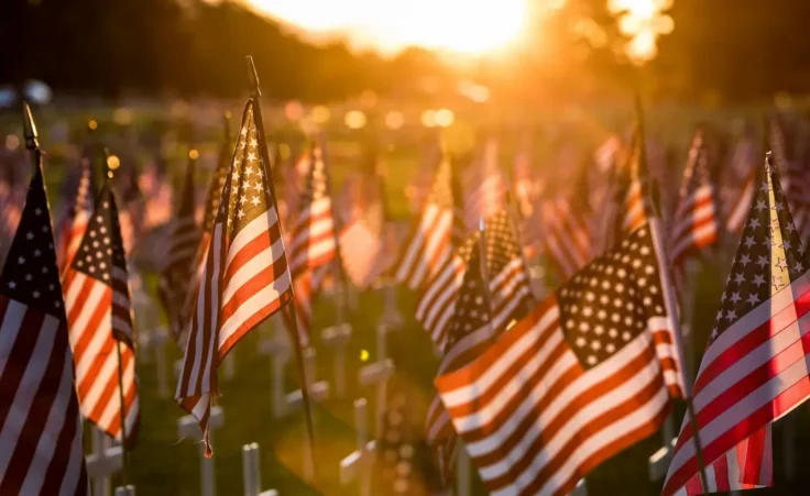 Field of American flags at Sunset By Andrew Seeg/stock.adobe.com