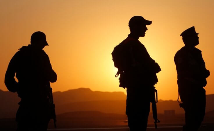 Israeli security officers patrol at a roadblock near Tzihor junction, about 60km (37 miles) north of the Red Sea resort o Eilat, August 18, 2011 (Credit: Reuters/Ronen Zvulun)