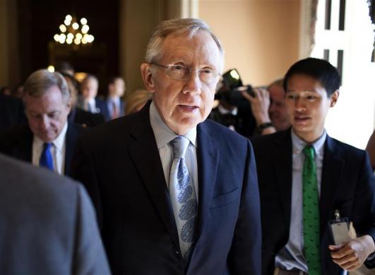 Senate Majority Leader Harry Reid (D-NV) speaks with reporters after meeting with House Democratic leadership on the debt ceiling crises on Capitol Hill in Washington July 31, 2011. REUTERS/Joshua Roberts