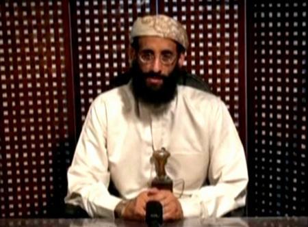 Anwar al-Awlaki, a U.S.-born cleric linked to al Qaeda's Yemen-based wing, gives a religious lecture in an unknown location in this still image taken from video released by Intelwire.com on September 30, 2011. Anwar al-Awlaki has been killed, Yemen's Defence Ministry said on Friday. A Yemeni security official said Awlaki, who is of Yemeni descent, was hit in a Friday morning air raid in the northern al-Jawf province that borders oil giant Saudi Arabia. REUTERS/Intelwire.com