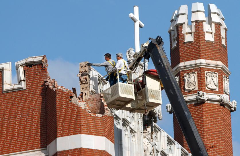 An eathquake late Saturday night caused extensive damage to the towers (turrets) atop Benedictine Hall, the most prominent structure on the campus of St. Gregory's University in Shawnee (Credit: The Oklahoman/Jim Beckel)