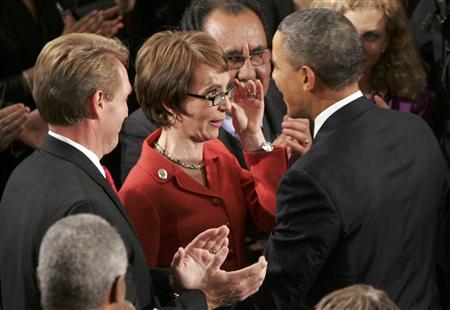 President Barack Obama (R) talks with Representative Gabrielle Giffords, shot in the head during a shooting spree in Tucson, Arizona last year as Rep. Jeff Flake (L) looks on before Obama's State of the Union address to a joint session of Congress on Capitol Hill in Washington, January 24, 2012. Credit: Reuters/Jonathan Ernst