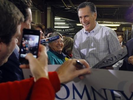 Mitt Romney greets supporters during a campaign stop at Cherokee Trikes and More in Greer, South Carolina January 12, 2012 (Credit: Reuters/Brian Snyder)
