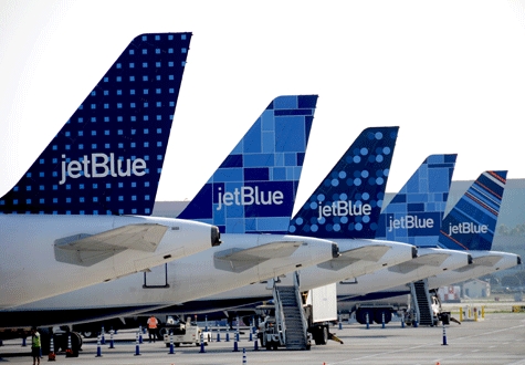 A lineup of JetBlue tailfins taken by ground operations crewmember Jacob in Long Beach, (from left to right): dots, mosaic, bubbles, and barcode (Credit: JetBlue/Blue Tales blog/Jason)