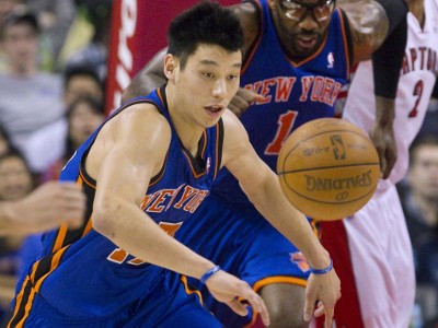 New York Knicks Jeremy Lin chases a loose ball in the first half of their NBA basketball game against the Toronto Raptors in Toronto March 23, 2012 (Credit: Reuters/Fred Thornhill)