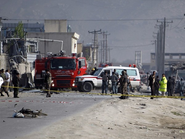 Afghan security forces members inspect the site of a car bomb attack in Kabul May 2, 2012 (Credit: Reuters/Omar Sobhani)