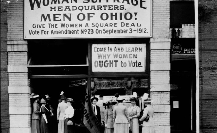 Woman suffrage headquarters in Upper Euclid Avenue, Cleveland--A. (at extreme right) is Miss Belle Sherwin, President, National League of Women Voters; B. is Judge Florence E. Allen (holding the flag); C. is Mrs. Malcolm McBride