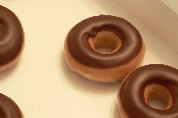 Krispy Kreme donuts with chocolate icing taken during a scavenger hunt in Atlanta (Credit: Valerie Renee via Flickr)