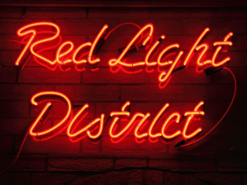red light district red neon sign on a red brick wall (Credit: kirilart via fotolia.com)