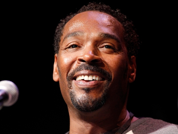 Rodney King smiles during a discussion for his memoir The Riot Within: My Journey from Rebellion to Redemption at the Los Angeles Times Festival of Books on the campus of the University of Southern California in Los Angeles in this April 21, 2012 file photo (Credit: Reuters/Danny Moloshok)