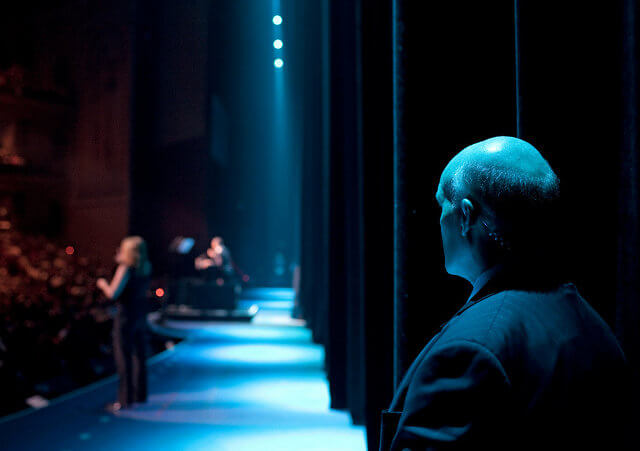 A Secret Service agent offstage watches as President Barack Obama speaks during a Las Vegas fundraiser for Sen. Harry Reid at Caesars Palace on May 26, 2009 (Credit: Official White House photo by Pete Souza)