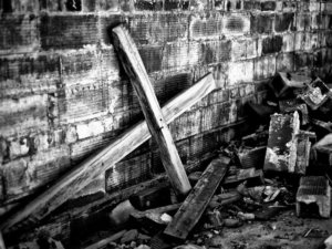 A cross lying in the basement of Friendship United Methodist Church after the church was moved (Credit: Judd McCullum via Flickr)
