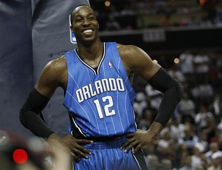 Orlando Magic center Dwight Howard (12) smiles in the second half against the Charlotte Bobcats during Game 4 of their NBA Eastern Conference playoff basketball series in Charlotte, North Carolina April 26, 2010 (Credit: Reuters / Jason Miczek)