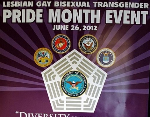 A poster (top portion cropped) hanging in the Pentagon to advertise Tuesday's lesbian, gay, bisexual and transgender Pride Month celebration (Credit: Jennifer Hlad/Stars and Stripes)