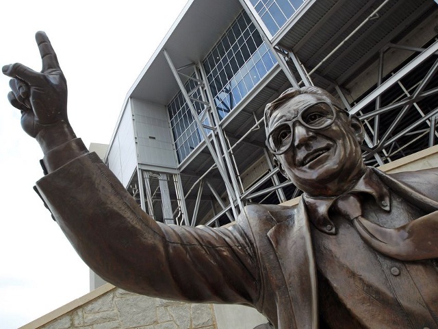 A statue of former Penn State Football coach Joe Paterno stands outside Beaver Stadium on the Penn State campus Wedneday, July 11, 2012, in State College, Pa (Credit: Gene J Puskar / AP)