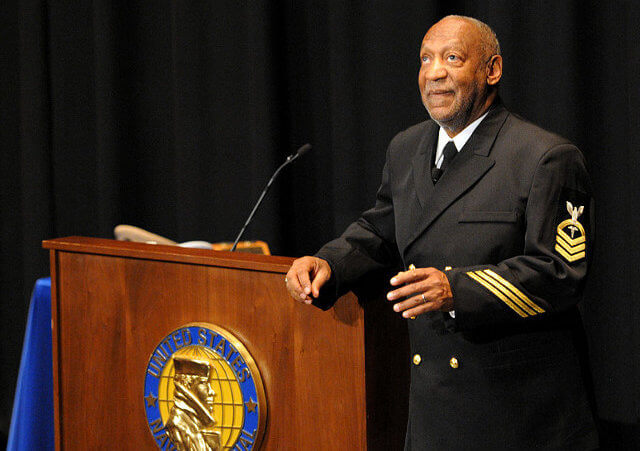 Honorary Chief Hospital Corpsman Bill Cosby delivers remarks during his pinning ceremony at the U.S. Navy Memorial in Washington, D.C. February 17, 2011 (Credit: U.S. Navy / Mass Communication Specialist 2nd Class Jay M. Chu)
