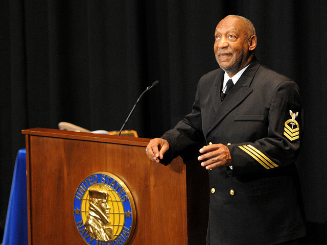 Honorary Chief Hospital Corpsman Bill Cosby delivers remarks during his pinning ceremony at the U.S. Navy Memorial in Washington, D.C. February 17, 2011 (Credit: U.S. Navy / Mass Communication Specialist 2nd Class Jay M. Chu)