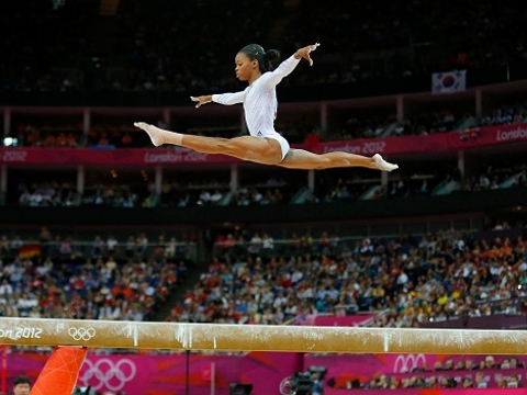 Gabrielle Douglas of the U.S. competes in the women's gymnastics balance beam final in the North Greenwich Arena during the London 2012 Olympic Games (Credit: Reuters / Mike Blake)