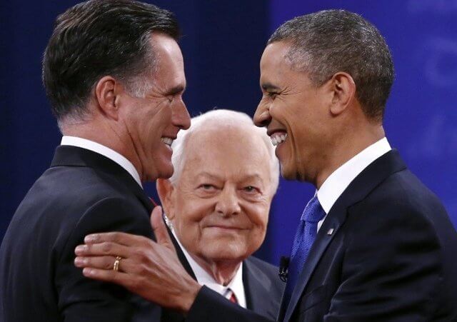 President Obama and Mitt Romney shake hands at the start of the final presidential debate at Lynn University in Boca Raton, October 22, 2012. At center is moderator Bob Schieffer (Credit: Reuters/Kevin Lamarque)