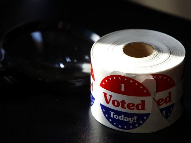 A roll of I Voted Today stickers await early voters at a polling station in downtown Washington October 24, 2012 (Credit: Reuters/Gary Cameron)