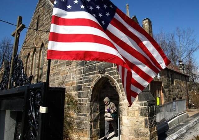 Darlene Norman leaves Glen Echo United Presbyterian Church after casting her vote today. (Credit: The Columbus Dispatch / Brooke LaValley)