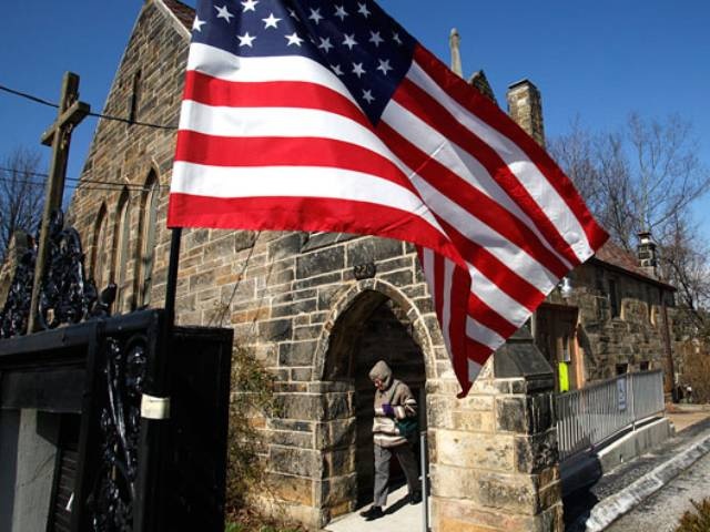 Darlene Norman leaves Glen Echo United Presbyterian Church after casting her vote today. (Credit: The Columbus Dispatch / Brooke LaValley)