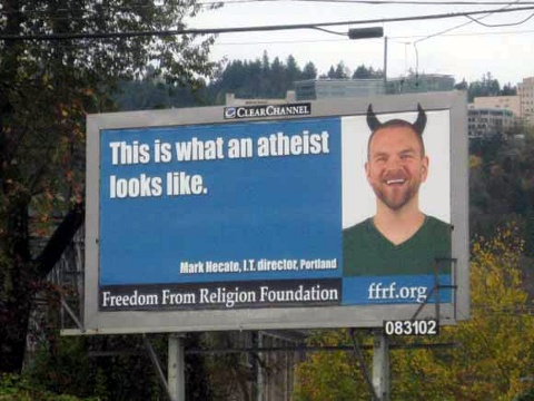 A Freedom From Religion Foundation billboard in Portland, Oregon was recently vandalized with spray-painted devil horns (Credit: Freedom From Religion Foundation)