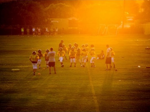 A Tustin Cobras Pop Warner team holds a practice at Foothill High School, September 19, 2012. (Credit: The Orange County Register, Leonard Ortiz)