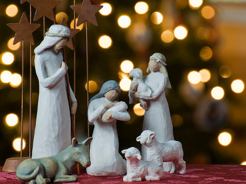 A depiction of the Nativity with a Christmas tree backdrop (Credit: Jeff Weese via Flickr)