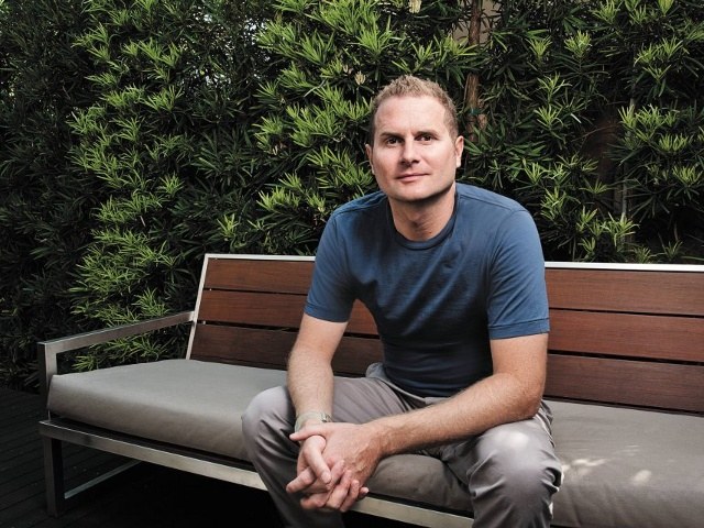 Rob Bell sitting on a bench in front of some bushes (Credit: Rob Bell via Facebook)