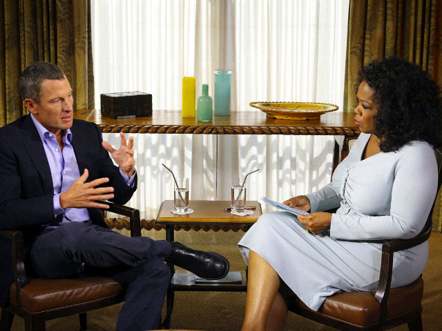 In this handout photo provided by the Oprah Winfrey Network, Oprah Winfrey (R) speaks with Lance Armstrong during an interview regarding the controversy surrounding his cycling career January 14, 2013 in Austin, Texas (Credit: Harpo Studios, Inc/George Burns)