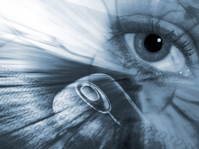 Are we being watched a concept with eye, mouse and binary digits (Credit: Ronald Hudson via Fotolia)