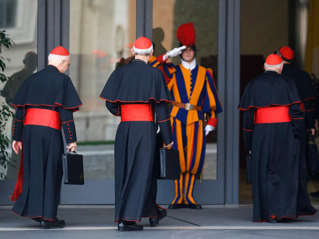 Cardinals Francis E. George of Chicago, Donald W. Wuerl of Washington and Theodore E. McCarrick, retired archbishop of Washington, arrive for a general congregation meeting in the synod hall at the Vatican March 5. The world's cardinals are meeting for several days in advance of the conclave to elect the new pope (Credit: CNS photo/Stefano Rellandini/Reuters)