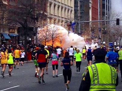 Boston bombings: a view of the second explosion, facing east down Boylston Street and Copley Square, near the finish line of the Boston Marathon, in Boston, Massachusetts, April 15, 2013 (Credit: Dan Lampariello via Twitter)
