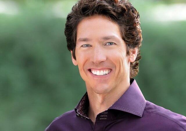 Joel Osteen in his Facebook profile photo standing outside wearing a cool purple shirt (Credit: Joel Osteen via Facebook)