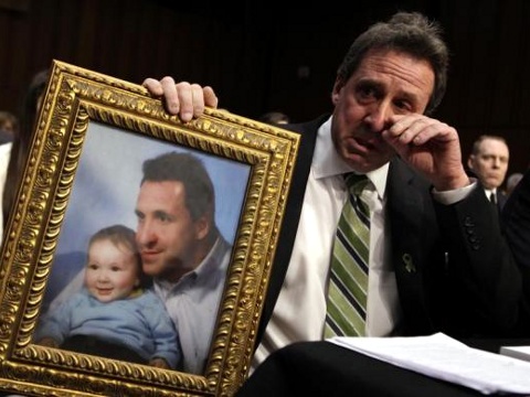 Neil Heslin, father of 6-year-old Newtown victim Jesse Lewis, cries during the Senate Judiciary Committee hearing on the Assault Weapons Ban of 2013 on Capitol Hill in Washington, February 27, 2013 (Credit: Reuters/Yuri Gripas)