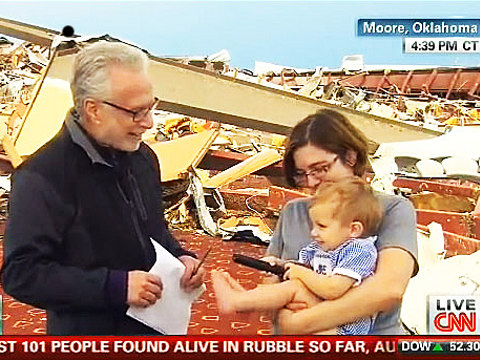 CNN Wolf Blitzer interviews Oklahoma tornado survivor and atheist Rebecca Vitsmun and he asks her if she thanks God for her survival (Credit: CNN)