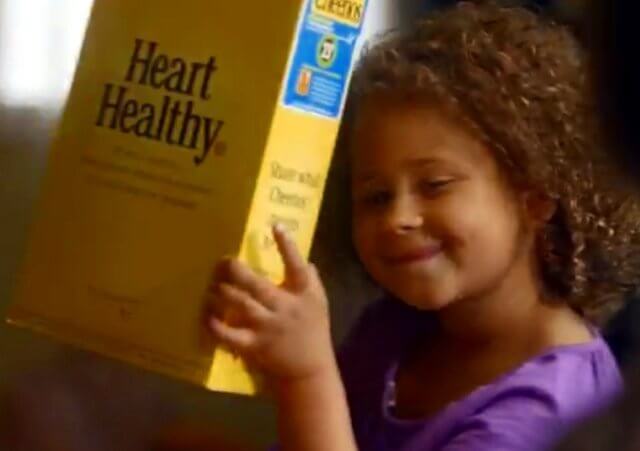 screen grab from a Cheerios commercial that is part of their Just Checking campaign. The commercial has created a controversy because of its depiction of an interracial family (Credit: Cheerios)