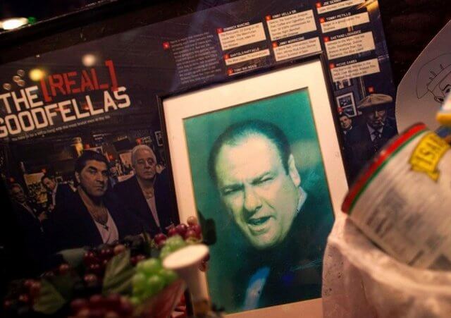 A photo of James Gandolfini is displayed in the window of a restaurant in Little Italy, New York in tribute to the actor (Credit: Reuters/Eric Thayer)