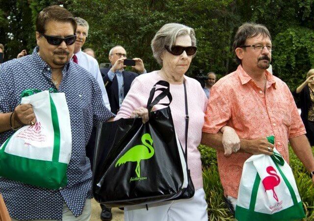 Gloria C. Mackenzie, an 84-year-old woman from Zephyrhills, Florida (C), her son Scott (R) and a person identified by Lottery Officials as a trusted family friend (L) leave the Florida Lottery offices after claiming the largest single jackpot in American lottery history, valued at $590 million, in Tallahassee, June 5, 2013 (Credit: Reuters/Colin Hackley)