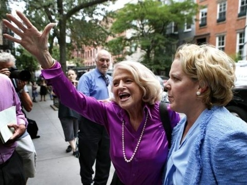 Edie Windsor (C) reacts to cheers as she arrives for a news conference following the U.S. Supreme Court 5-4 ruling striking down as unconstitutional the Defense of Marriage Act, in New York June 26, 2013 (Credit: Reuters/Mike Segar)