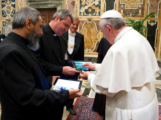 Pope Francis launches the smartphone app Missio during an audience at the Vatican (CNS photo/L'Osservatore Romano via Catholic Press Photo)