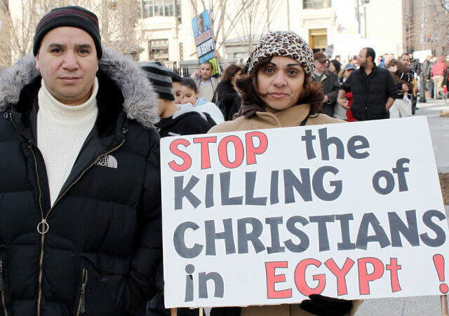 Coptic Christians protest outside the White House over the violence and the treatment of Coptic Christians by the Egyptian government (Credit: Talk Radio News Service via Flickr)