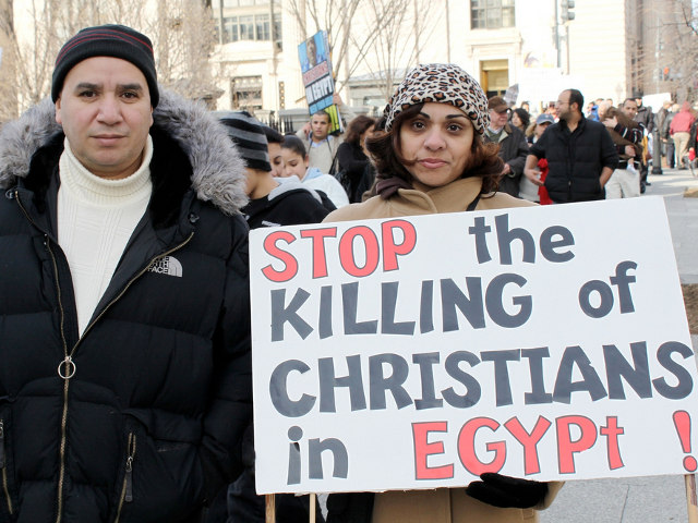Coptic Christians protest outside the White House over the violence and the treatment of Coptic Christians by the Egyptian government (Credit: Talk Radio News Service via Flickr)