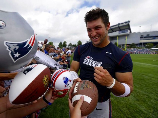 Tim Tebow, the Patriots renowned third-string quarterback, has signed autographs nearly every day since the start of training camp this year (Credit: AP/Steven Senne)